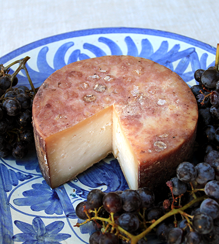 Queso macerado con uvas